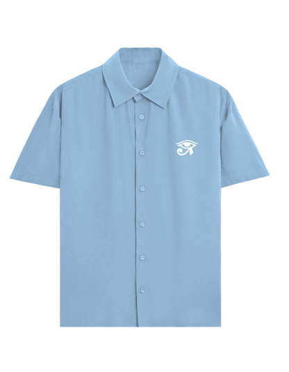 A light blue short-sleeve button-up shirt with a white graphic logo on the left chest