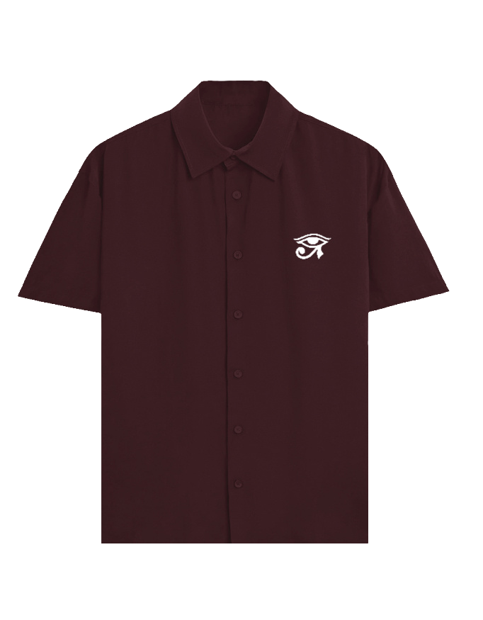 Maroon shirt with a graphic design on the chest