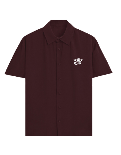 Maroon shirt with a graphic design on the chest