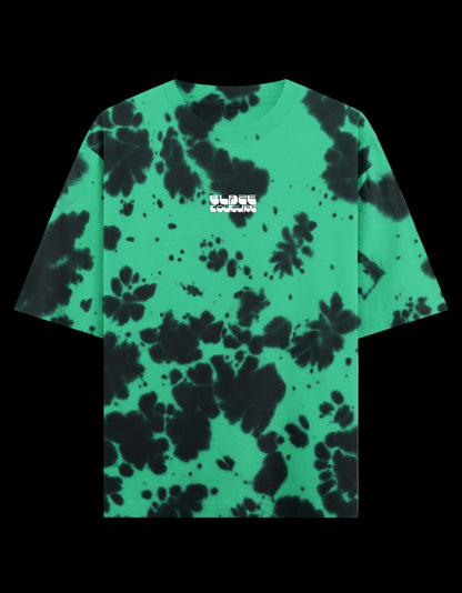 Green and black tie-dye t-shirt with a Blaze Couture embroidered logo on a black background