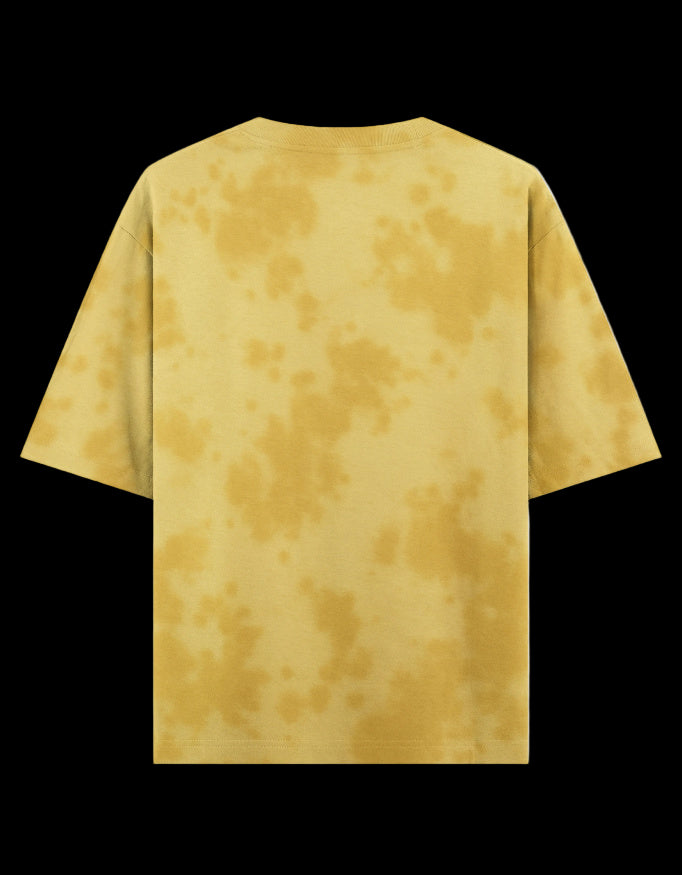 Back of Yellow tie-dye t-shirt with a Blaze Couture embroidered logo on a black background